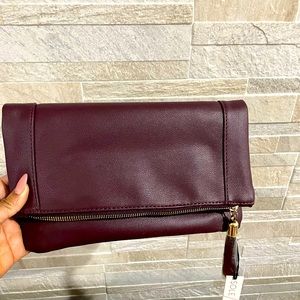 Brand new with tags! Wine colored-clutch.